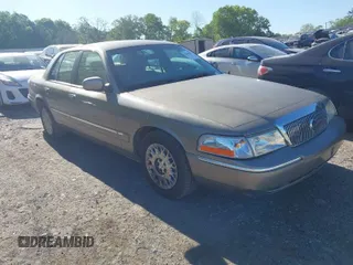 2003 Mercury Grand Marquis GS Convenience with VIN 2MEFM74W13X613755, listed as a IAAI auction lot 42049691 with 137,208 mi miles and . Bid and sale history available at DreamBid. Image 1.