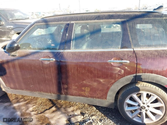 2016 MINI Cooper Clubman with VIN WMWLN5C50G2E29740, listed as a IAAI auction lot 41345976 with 67,124 mi miles. Bid and sale history available at carsss.com. Image 14.