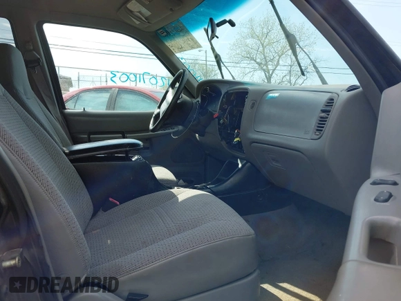 1999 Ford Explorer XL z VIN 1FMZU34X2XUA06174, wystawiony jako IAAI lot #42071003 z przebiegiem 126 220 mil mil oraz . Historia ofert i sprzedaży dostępna na DreamBid. Obrazek 5.