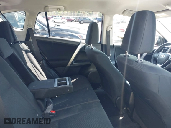 2018 Toyota RAV4 LE with VIN JTMBFREV2JD228186, listed as a IAAI auction lot 42076730 with 93,899 mi miles. Bid and sale history available at carsss.com. Image 8.