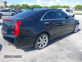 2013 Cadillac ATS Performance z VIN 1G6AC5S31D0125484, wystawiony jako IAAI lot #42357376 z przebiegiem 91 476 mil mil oraz . Historia ofert i sprzedaży dostępna na DreamBid. Obrazek 4.