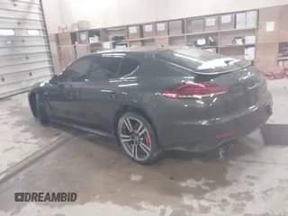 2014 Porsche Panamera GTS with VIN WP0AF2A73EL083133, listed as a IAAI auction lot 41945656 with 75,701 mi miles and . Bid and sale history available at DreamBid. Image 3.
