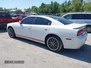 2014 Dodge Charger SE with VIN 2C3CDXBG2EH258886, listed as a IAAI auction lot 42104999 with 185,723 mi miles. Bid and sale history available at carsss.com. Image 3.