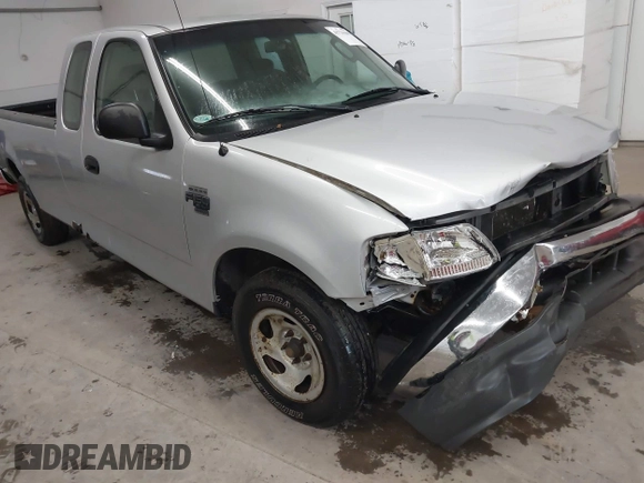 2002 Ford F-150 XL with VIN 1FTRX17W52NB23883, listed as a IAAI auction lot 41721680 with 144,115 mi miles. Bid and sale history available at carsss.com. Image 6.