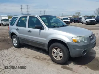 2007 Ford Escape XLS with VIN 1FMYU02Z97KB80446, listed as a IAAI auction lot 42113186 with 128,492 mi miles. Bid and sale history available at carsss.com. Image 1.