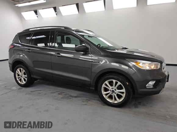 2018 Ford Escape SE with VIN 1FMCU0GD6JUA74555, listed as a Copart auction lot 54448535 with 114,848 mi miles and Clean Title. Bid and sale history available at carsss.com. Image 4.