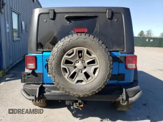 2016 Jeep Wrangler Unlimited Rubicon z VIN 1C4HJWFG2GL253918, wystawiony jako Copart lot #52332475 z przebiegiem 153 813 mil mil oraz Szkoda całkowita • Salvage title. Historia ofert i sprzedaży dostępna na DreamBid. Obrazek 6.
