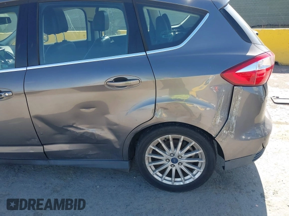 2014 Ford C-Max SEL z VIN 1FADP5BU2EL505043, wystawiony jako IAAI lot #42384560 z przebiegiem 392 782 mil mil oraz . Historia ofert i sprzedaży dostępna na DreamBid. Obrazek 6.