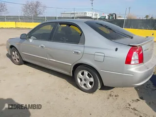 2003 Kia Spectra GS z VIN KNAFB161535095413, wystawiony jako IAAI lot #41478418 z przebiegiem 141 441 mil mil oraz . Historia ofert i sprzedaży dostępna na DreamBid. Obrazek 3.