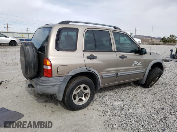 2003 Chevrolet Tracker ZR2 z VIN 2CNBJ734936905776, wystawiony jako Copart lot #48195115 z przebiegiem 133 770 mil mil oraz Szkoda całkowita • Salvage title. Historia ofert i sprzedaży dostępna na DreamBid. Obrazek 3.