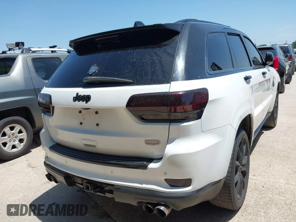 2015 Jeep Grand Cherokee Summit с VIN 1C4RJFJTXFC173287, выставлен на аукционе IAAI как лот 42794100 с пробегом 125 705 миль миль и . История ставок и продаж доступна на DreamBid. Изображение 4.