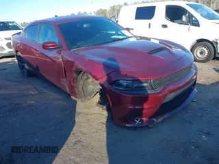 2019 Dodge Charger GT z VIN 2C3CDXHG0KH597097, wystawiony jako IAAI lot #41273019 z przebiegiem 99 534 mil mil oraz . Historia ofert i sprzedaży dostępna na DreamBid. Obrazek 1.
