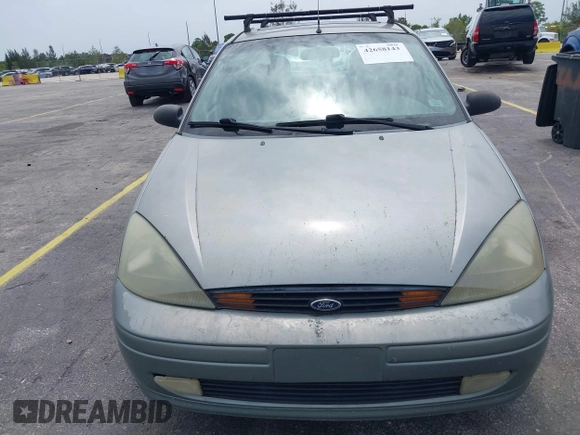 2004 Ford Focus with VIN 3FAFP37Z74R103228, listed as a IAAI auction lot 42658143 with 90,519 mi miles and . Bid and sale history available at DreamBid. Image 6.