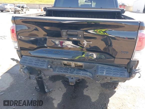 2021 Toyota Tacoma SR z VIN 3TMCZ5AN3MM421868, wystawiony jako IAAI lot #42003665 z przebiegiem 39 380 mil mil oraz . Historia ofert i sprzedaży dostępna na DreamBid. Obrazek 6.