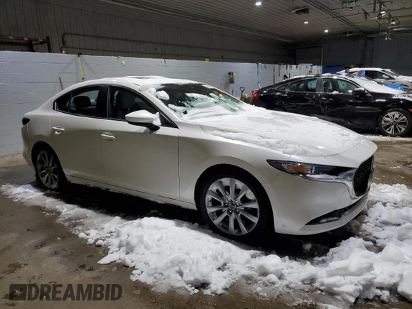 2022 Mazda 3 Carbon Edition с VIN 3MZBPACL7NM317176, выставлен на аукционе Copart как лот 45314715 с пробегом Не указан миль и Списание • Salvage title. История ставок и продаж доступна на DreamBid. Изображение 4.