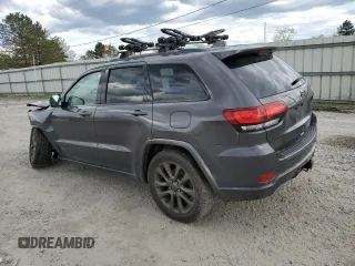 2016 Jeep Grand Cherokee Limited 75th Anniversary with VIN 1C4RJFBG4GC489464, listed as a Copart auction lot 55278935 with 176,572 mi miles and Salvage Title. Bid and sale history available at DreamBid. Image 2.