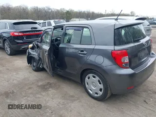 2014 Scion xD with VIN JTKKUPB44E1042798, listed as a IAAI auction lot 41934263 with 30,390 mi miles and . Bid and sale history available at DreamBid. Image 3.