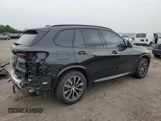 2024 BMW X5 xDrive50e with VIN 5UX43EU02R9U91727, listed as a Copart auction lot 64155574 with 7,050 mi miles and Salvage Title. Bid and sale history available at carsss.com. Image 3.