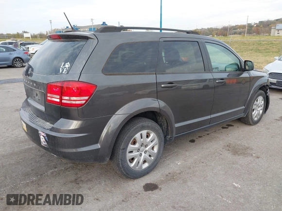 2018 Dodge Journey SE with VIN 3C4PDCABXJT170150, listed as a IAAI auction lot 40715756 with 113,330 mi miles and . Bid and sale history available at DreamBid. Image 4.