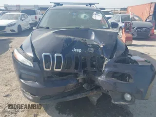 2015 Jeep Cherokee Latitude with VIN 1C4PJLCB9FW683459, listed as a IAAI auction lot 41998309 with 176,769 mi miles and . Bid and sale history available at carsss.com. Image 6.