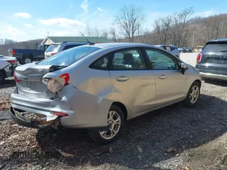 2016 Ford Fiesta SE with VIN 3FADP4BJ4GM106538, listed as a IAAI auction lot 41871345 with 123,847 mi miles. Bid and sale history available at carsss.com. Image 4.