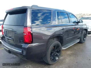 2015 Chevrolet Tahoe LTZ with VIN 1GNSCCKC8FR617540, listed as a IAAI auction lot 41356342 with 118,268 mi miles. Bid and sale history available at carsss.com. Image 4.