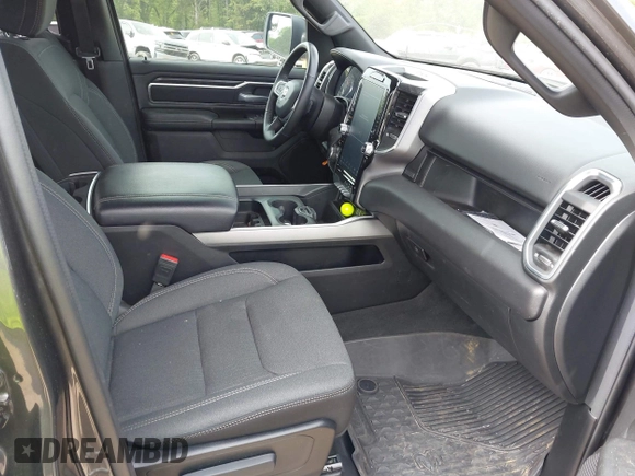 2024 Ram 1500 Lone Star with VIN 1C6SRFFT1RN125616, listed as a IAAI auction lot 42053680 with 57,274 mi miles and . Bid and sale history available at DreamBid. Image 5.