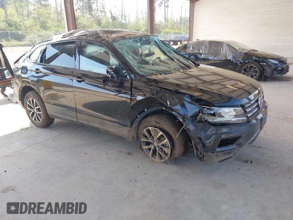 2021 Volkswagen Tiguan S with VIN 3VV0B7AX1MM098300, listed as a IAAI auction lot 42574636 with 53,559 mi miles and . Bid and sale history available at DreamBid. Image 1.