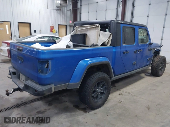 2021 Jeep Gladiator Willys with VIN 1C6HJTAG9ML535479, listed as a IAAI auction lot 41212241 with 81,044 mi miles and . Bid and sale history available at DreamBid. Image 4.