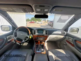 2003 Lexus LX 470 z VIN JTJHT00W933535214, wystawiony jako Copart lot #62037495 z przebiegiem 373 210 mil mil oraz Czysty tytuł • Clean title. Historia ofert i sprzedaży dostępna na DreamBid. Obrazek 9.