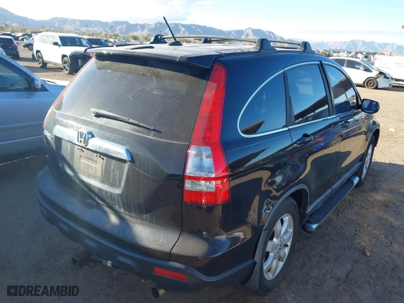 2009 Honda CR-V EX-L with VIN 5J6RE38769L018276, listed as a IAAI auction lot 41690588 with 152,784 mi miles. Bid and sale history available at carsss.com. Image 4.