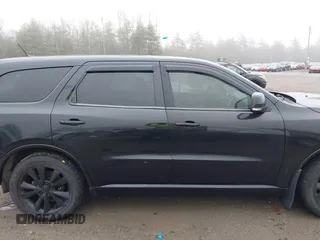 2013 Dodge Durango R/T with VIN 1C4SDJCT8DC520864, listed as a IAAI auction lot 41897974 with 170,580 mi miles and . Bid and sale history available at DreamBid. Image 14.