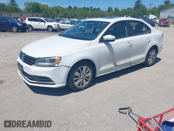 2015 Volkswagen Jetta SE z VIN 3VWD17AJ5FM233468, wystawiony jako IAAI lot #42366037 z przebiegiem 301 992 mil mil oraz . Historia ofert i sprzedaży dostępna na DreamBid. Obrazek 2.