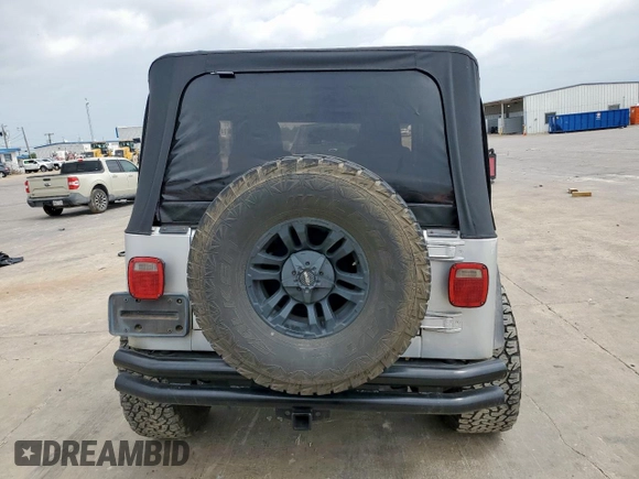 2004 Jeep Wrangler X z VIN 1J4FA39S34P702186, wystawiony jako Copart lot #59561675 z przebiegiem 202 214 mil mil oraz Szkoda całkowita • Salvage title. Historia ofert i sprzedaży dostępna na DreamBid. Obrazek 6.
