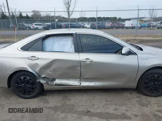 2017 Toyota Camry Hybrid LE with VIN 4T1BD1FK1HU213812, listed as a IAAI auction lot 41730565 with 67,706 mi miles. Bid and sale history available at carsss.com. Image 13.