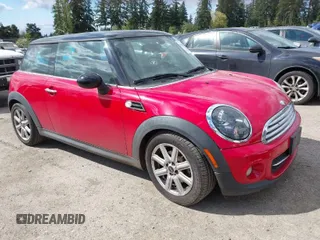 2013 MINI Cooper Hardtop with VIN WMWSU3C57DT677506, listed as a IAAI auction lot 42088836 with 130,344 mi miles. Bid and sale history available at carsss.com. Image 1.