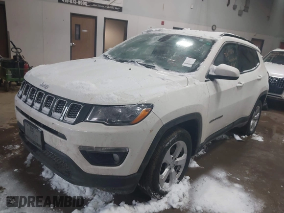 2020 Jeep Compass Latitude with VIN 3C4NJDBB3LT138454, listed as a IAAI auction lot 41614631 with 82,079 mi miles and . Bid and sale history available at DreamBid. Image 2.