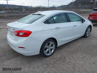 2016 Chevrolet Cruze Premier with VIN 1G1BG5SM4G7270991, listed as a IAAI auction lot 41882518 with 71,398 mi miles. Bid and sale history available at carsss.com. Image 4.