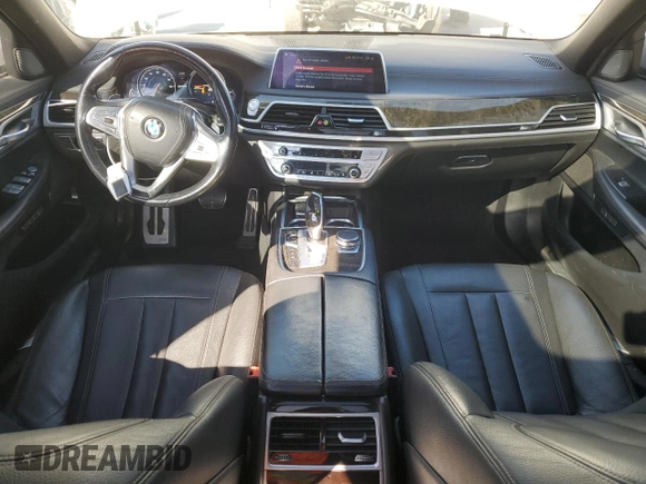 2018 BMW 7 Series 740e xDrive iPerformance with VIN WBA7J2C50JG938424, listed as a Copart auction lot 76085784 with 90,316 mi miles and Salvage Title. Bid and sale history available at carsss.com. Image 8.