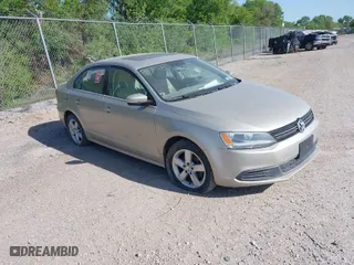 2013 Volkswagen Jetta Sedan TDI w/Premium with VIN 3VWLL7AJ1DM223278, listed as a IAAI auction lot 42024181 with 124,970 mi miles. Bid and sale history available at carsss.com. Image 1.