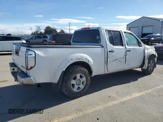2007 Nissan Frontier SE with VIN 1N6AD09W47C404666, listed as a Copart auction lot 48812115 with 208,063 mi miles and Salvage title. Bid and sale history available at DreamBid. Image 3.