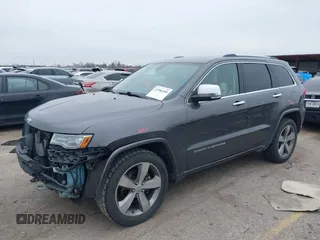 2014 Jeep Grand Cherokee Overland with VIN 1C4RJECG5EC207211, listed as a IAAI auction lot 41586309 with 115,293 mi miles. Bid and sale history available at carsss.com. Image 18.