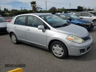 2009 Nissan Versa 1.8 S with VIN 3N1BC11E69L374261, listed as a Copart auction lot 47252795 with 70,600 mi miles and Salvage Title. Bid and sale history available at carsss.com. Image 4.