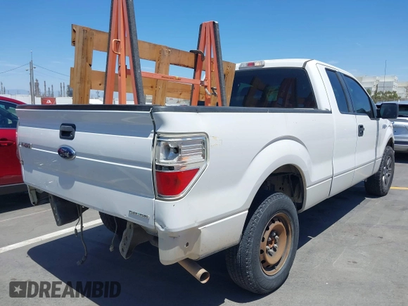 2014 Ford F-150 XL with VIN 1FTEX1CMXEFD13082, listed as a IAAI auction lot 40035539 with 204,751 mi miles and . Bid and sale history available at DreamBid. Image 4.