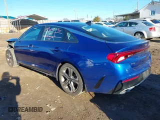2021 Kia K5 EX with VIN 5XXG34J2XMG045447, listed as a IAAI auction lot 41108034 with 58,683 mi miles. Bid and sale history available at carsss.com. Image 3.
