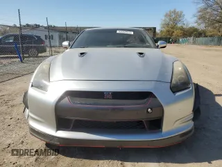 2009 Nissan GT-R Premium z VIN JN1AR54F89M252139, wystawiony jako Copart lot #52062915 z przebiegiem 73 483 mil mil oraz Szkody całkowita. Historia ofert i sprzedaży dostępna na DreamBid. Obrazek 5.