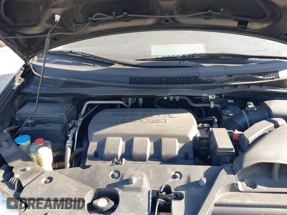 2012 Honda Odyssey EX-L with VIN 5FNRL5H6XCB016801, listed as a IAAI auction lot 42112141 with 164,671 mi miles and . Bid and sale history available at carsss.com. Image 10.