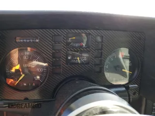 1986 Pontiac Fiero z VIN 1G2PG9799GP261135, wystawiony jako Copart lot #77305934 z przebiegiem 53 837 mil mil oraz Szkody całkowita. Historia ofert i sprzedaży dostępna na DreamBid. Obrazek 9.
