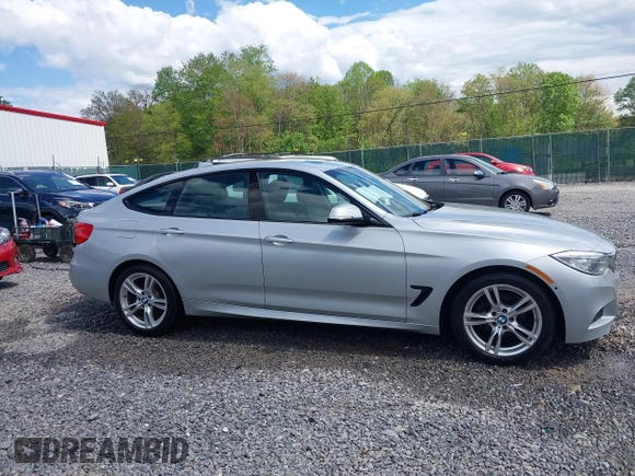 2014 BMW 3 Series 328i Gran Turismo xDrive z VIN WBA3X5C51ED556554, wystawiony jako IAAI lot #42149391 z przebiegiem 189 624 mil mil oraz . Historia ofert i sprzedaży dostępna na DreamBid. Obrazek 13.