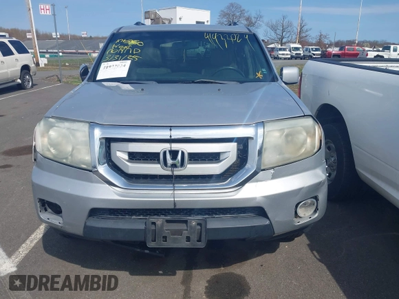 2011 Honda Pilot EX-L with VIN 5FNYF4H68BB017361, listed as a IAAI auction lot 41933024 with 338,819 mi miles and . Bid and sale history available at carsss.com. Image 10.